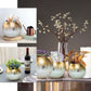 Gold foiled crackle glass bud vase centerpiece with round bubble bowl design.