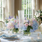 Clear ribbed glass trumpet vases for elegant flower centerpieces.