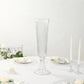 Clear ribbed glass trumpet vase for elegant flower centerpieces.