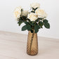 Amber gold diamond crystal cut urn vase with white roses.