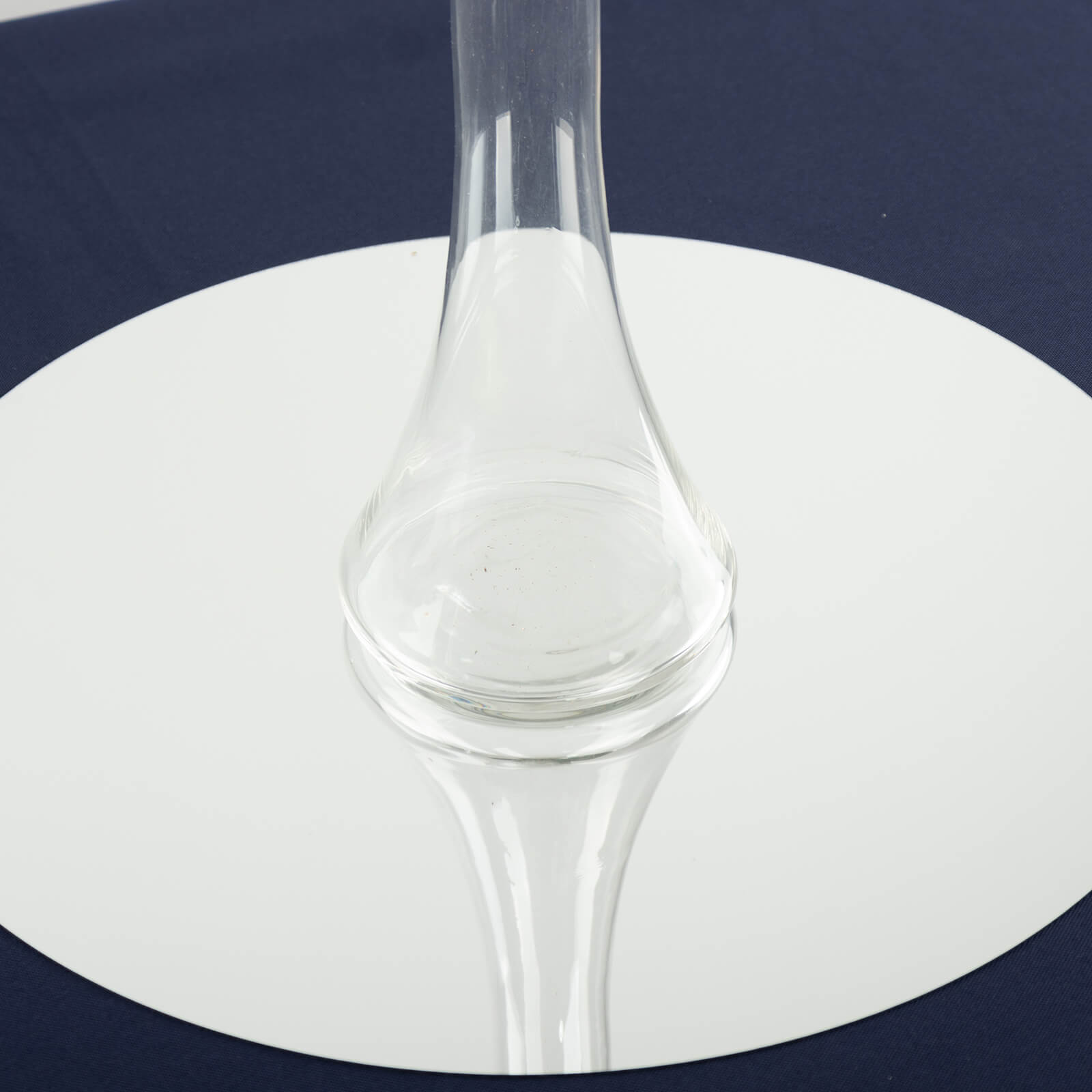 Clear glass Eiffel Tower vase with round base, 16" tall, on a mirror surface.