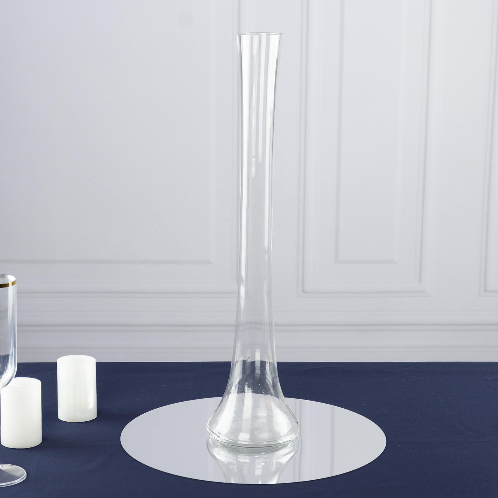 Clear glass Eiffel Tower vase, 20" tall, round base, perfect for centerpieces.