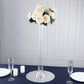 Clear glass Eiffel Tower vase with white roses, 24" tall centerpiece.