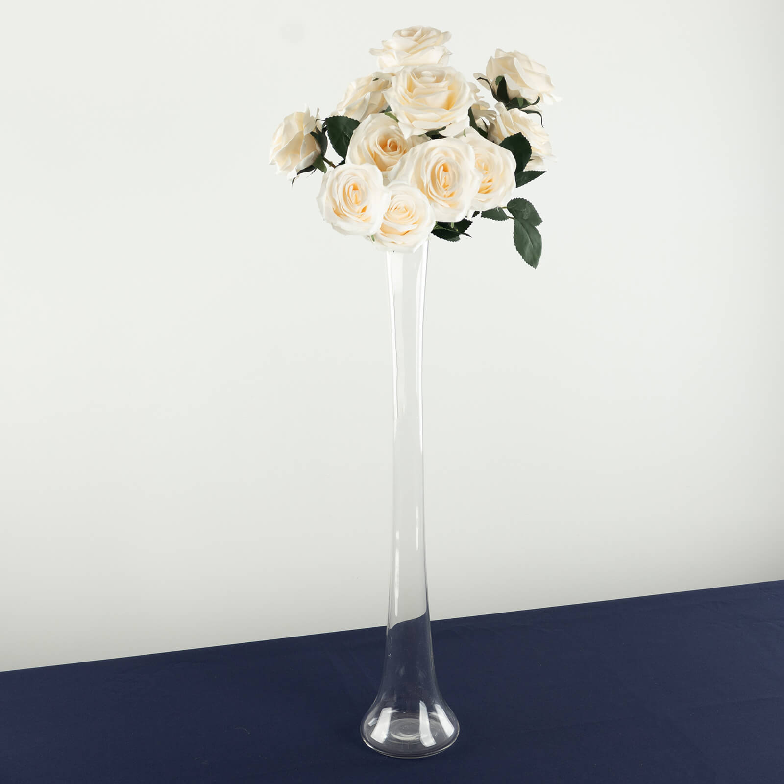 Clear heavy-duty glass Eiffel Tower vase with white roses, 24" tall centerpiece.