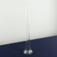 Clear glass Eiffel Tower vase, 24" tall, perfect for flower arrangements.