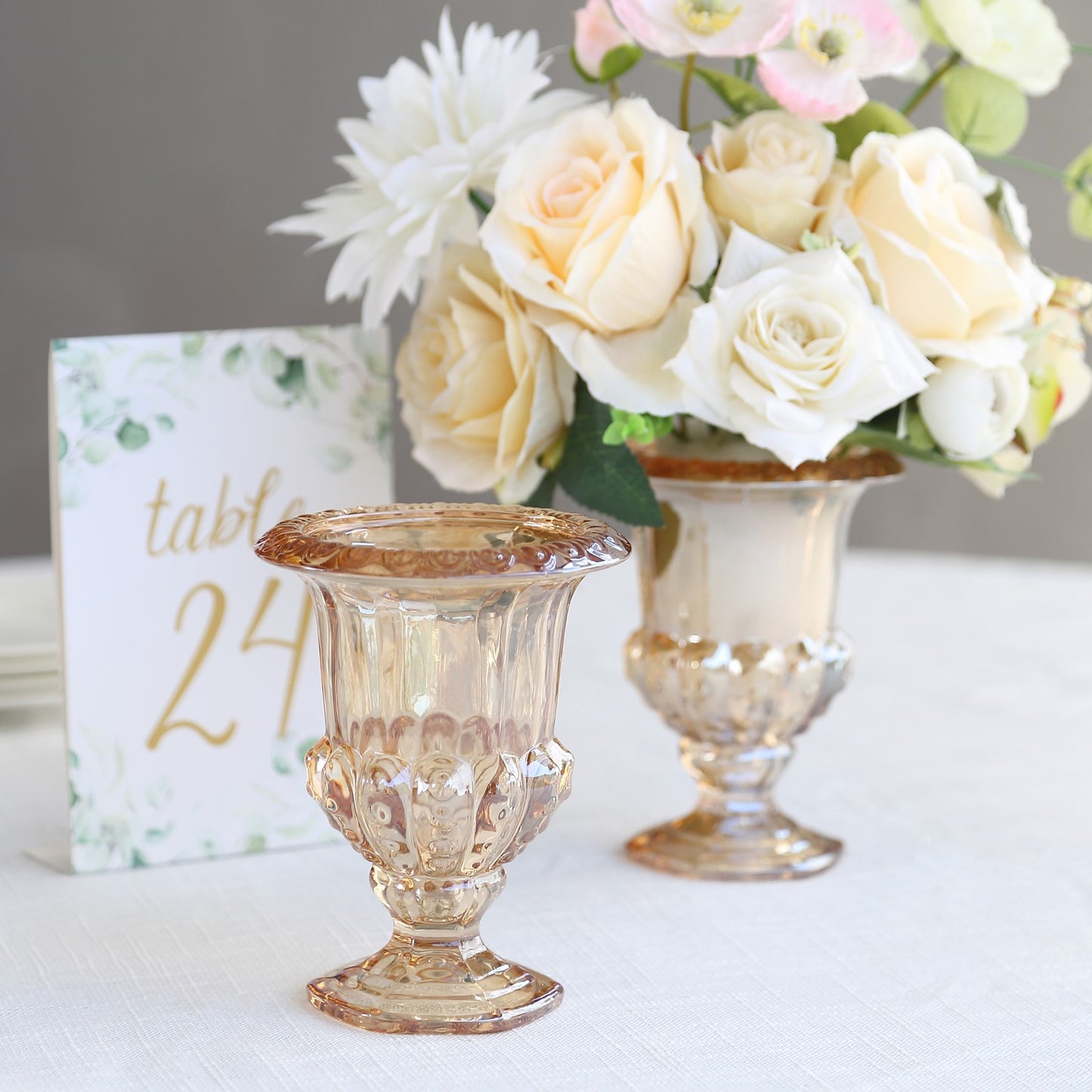 2 Pack Amber Gold Glass Pedestal Flower Vases in Classic Roman Urn Style, 6" Mini Floral Vase Table Centerpieces