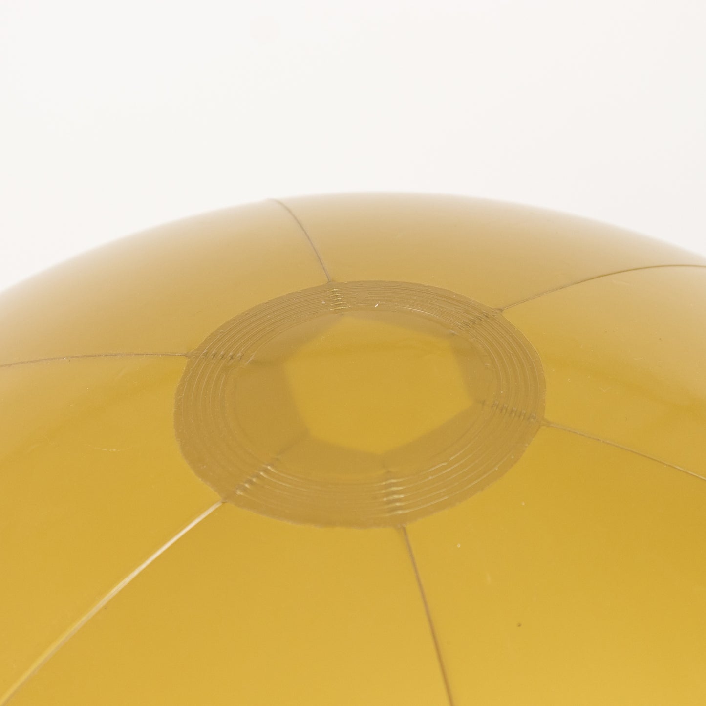 Inflatable gold decorative ball for pool and party fun.