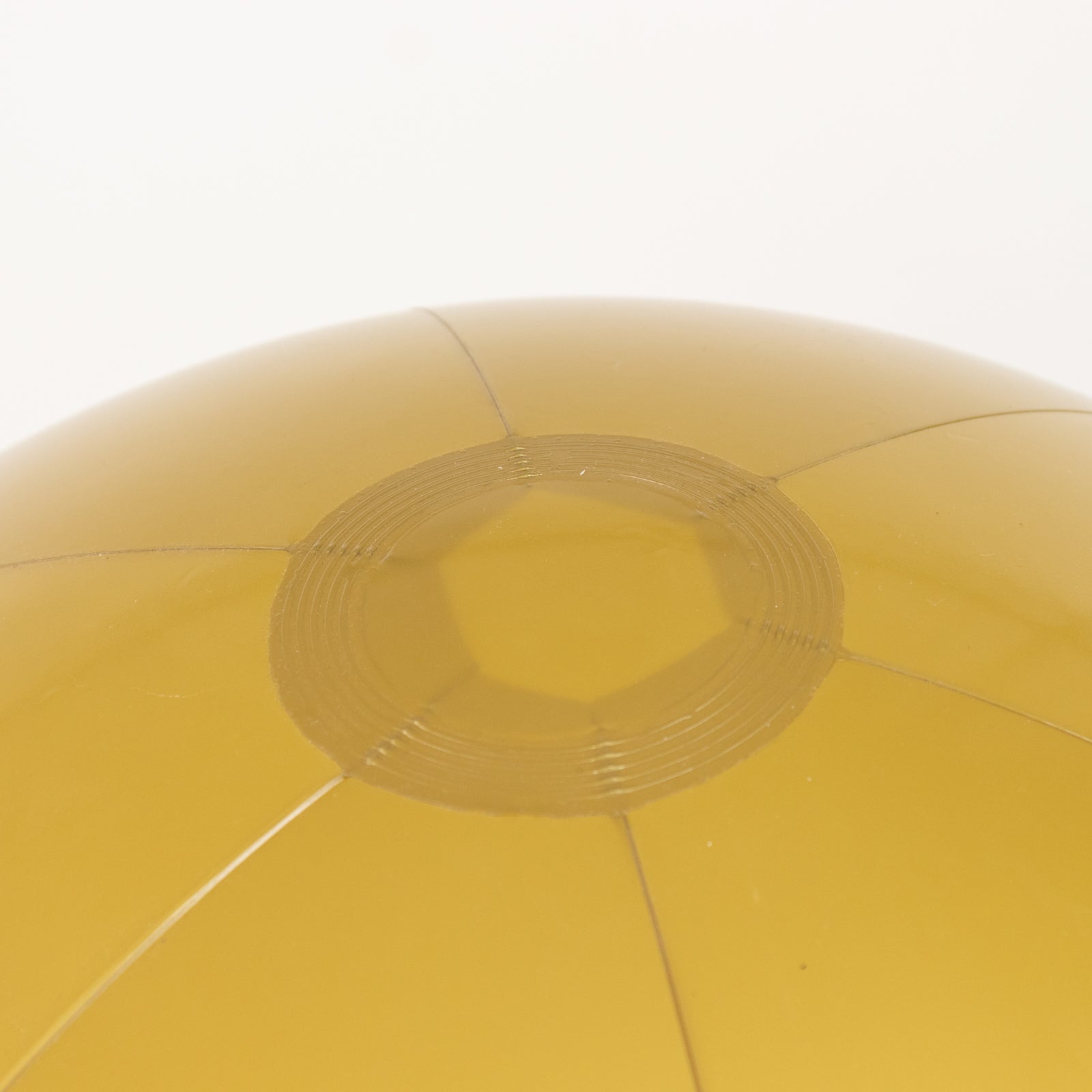 Inflatable gold decorative ball for pool and party fun.