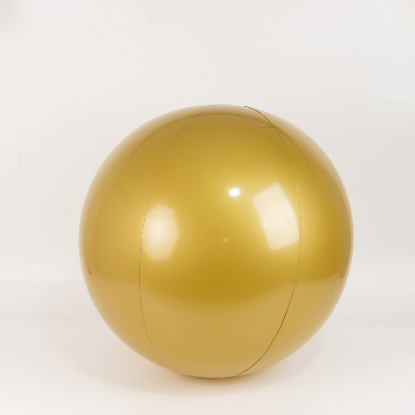 Gold inflatable decorative ball for pool and party use.