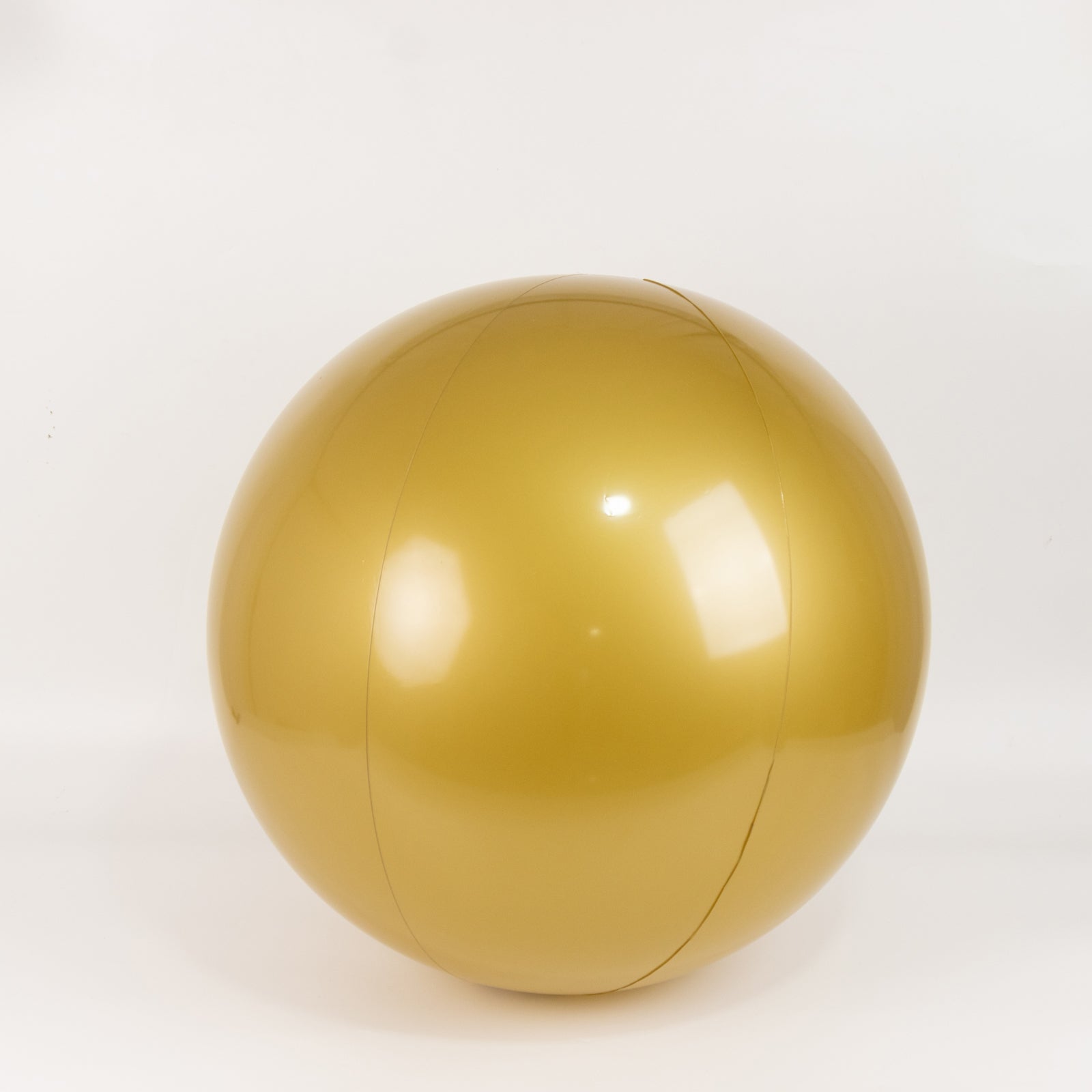 Gold inflatable decorative ball for pool and party use.