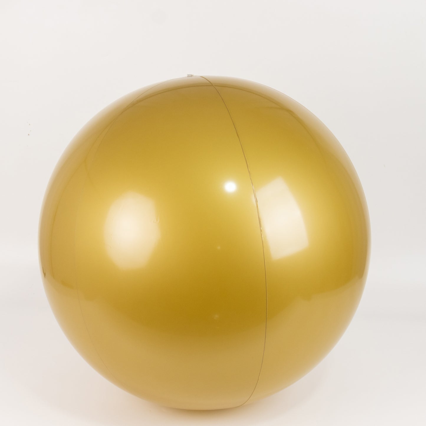 Gold inflatable decorative ball for pool and party fun.