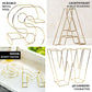 Gold 3D decorative wire letter centerpiece for weddings.