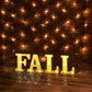 Gold 3D marquee letters "F" lit up with warm white LED lights.