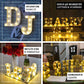 Gold 3D marquee numbers with warm white LED lights.