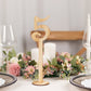Natural wooden wedding table number 5 on a stick with round base.