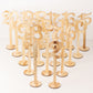 Set of 20 natural wooden wedding table numbers on sticks with round base.