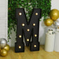 Giant LED Marquee Light Up Letter "M", Black 4ft Pre-Cut Foam Board with 10 Warm White Battery Operated LEDs, Glue Gun and Sticks