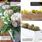 White rectangular wood planter box set with removable plastic liners and plants.