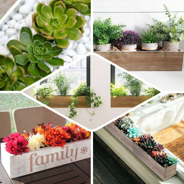 White rectangular wood planter box set with removable liners, featuring various plants.