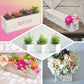 Whitewash rectangular wood planter box set with plastic liners.