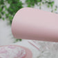 Pink disposable paper placemats for dining tables, 13-inch round, 50 pack.