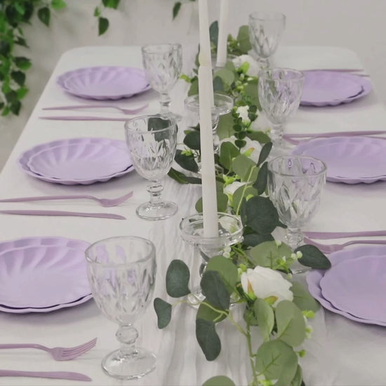 Lavender lilac biodegradable dinner plates on a festive table setting.