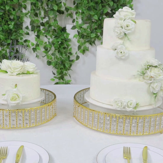 Gold round cake stand with hanging crystal beads and glass top.
