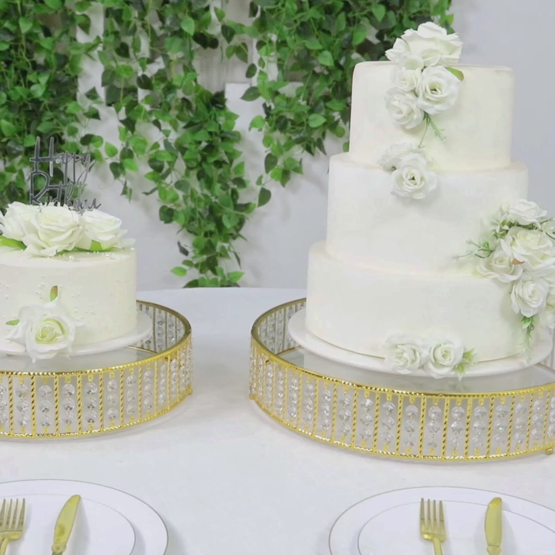 Gold round cake stand with hanging crystal beads and glass top.