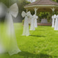 Giant white bow tie décor for wedding and event backdrops.