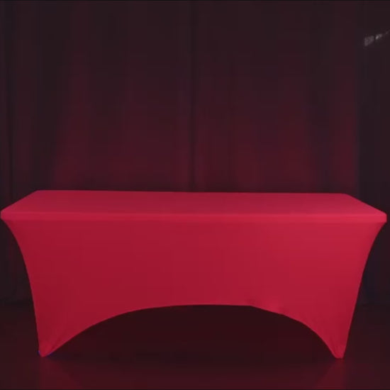 Glow neon fuchsia fitted spandex tablecloth on a 6ft rectangle table.