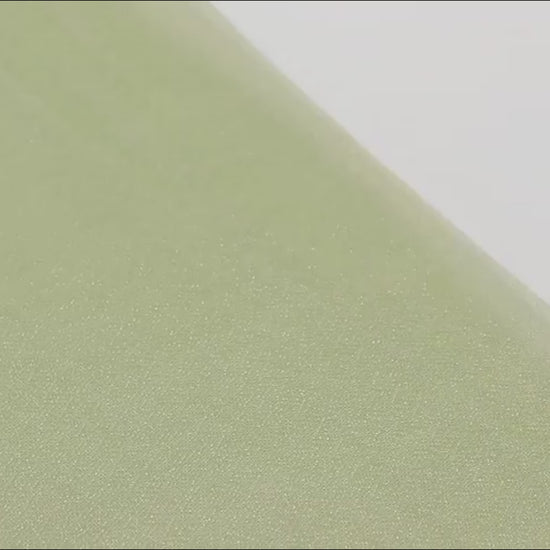 Dusty sage green sheer table runner with shimmer finish.