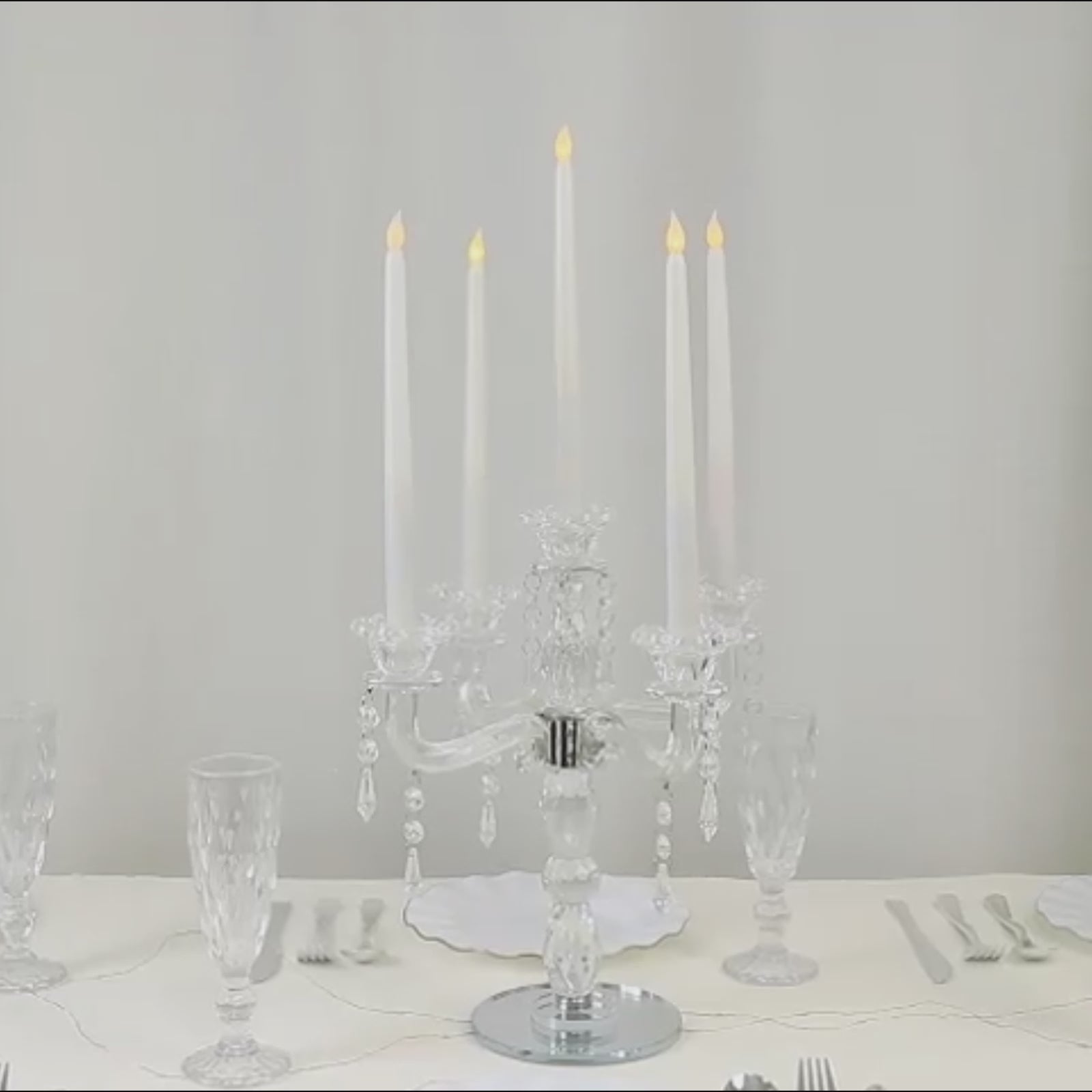 Crystal taper candle holder with 5 arms, elegant centerpiece, clear color.