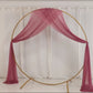Mauve sheer backdrop drape for wedding arch and ceiling decor.