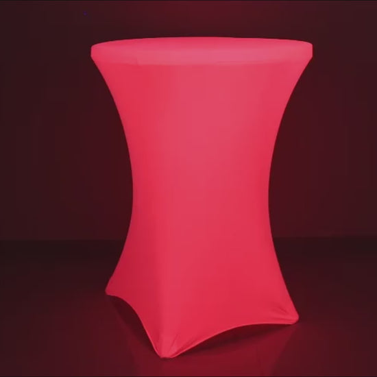 Glow Neon Fuchsia Fitted Spandex Cocktail Tablecloth on a round table.
