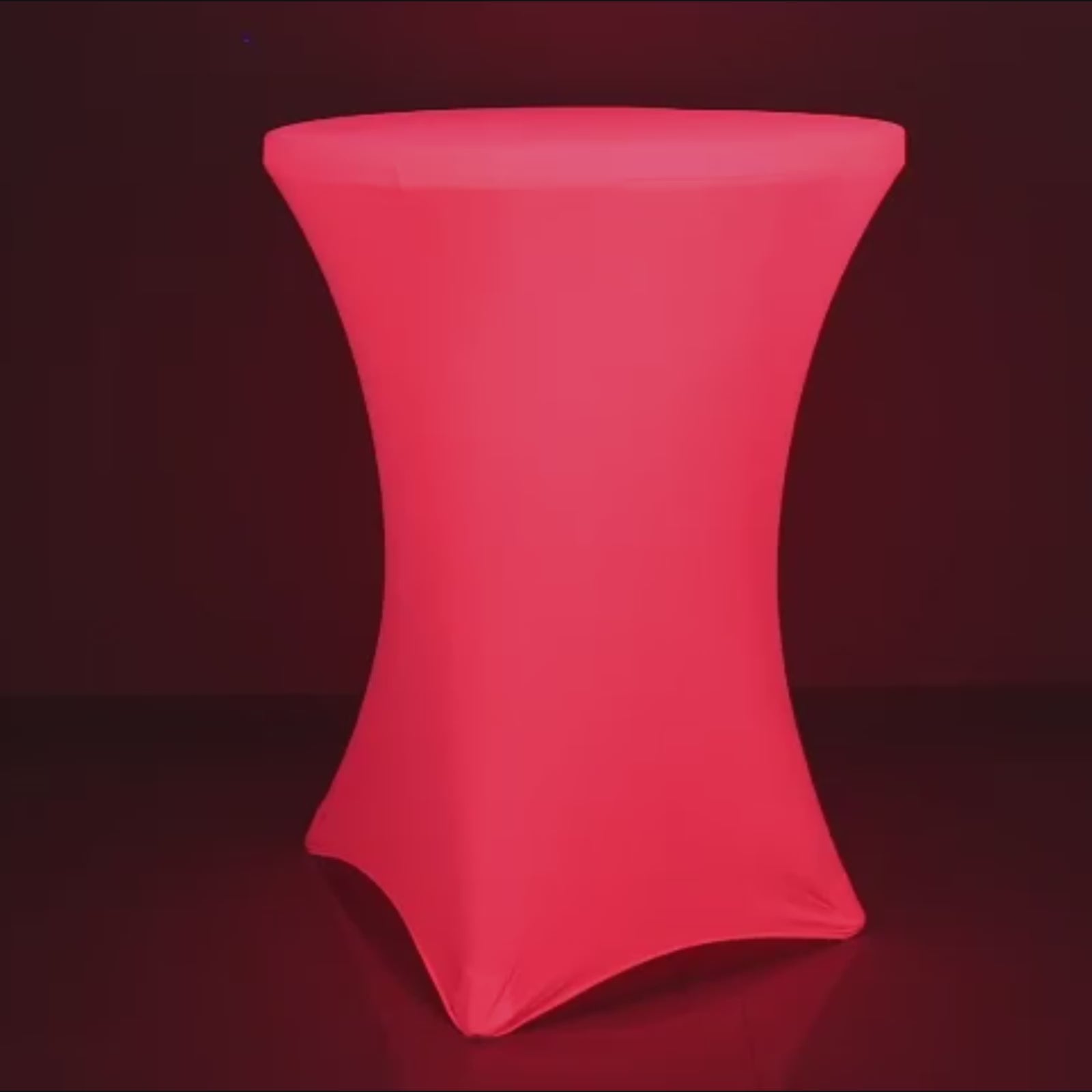 Glow Neon Fuchsia Fitted Spandex Cocktail Tablecloth on a round table.