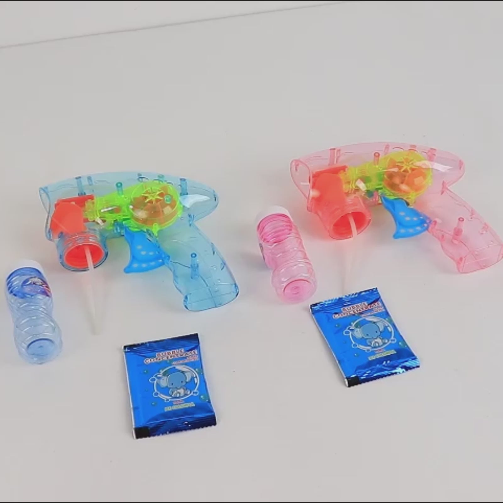 6-Pack LED bubble guns in blue and pink with refillable bottles and solution.