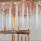 Gold crystal pendant centerpiece with hanging crystals.