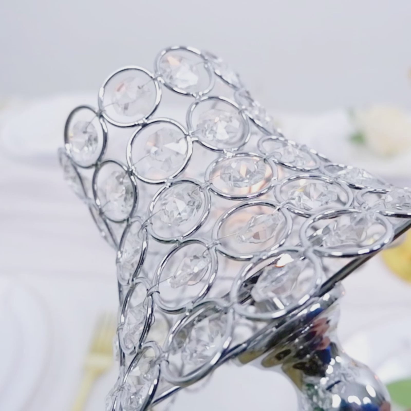 Silver crystal beaded candle holder with lamp-inspired shade.