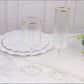 Clear champagne flutes with gold rim, elegant design for celebrations.
