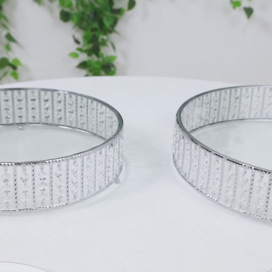 14" round silver cake stand with hanging crystal beads and glass top.