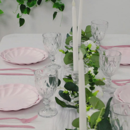 Blush biodegradable dinner plates on a beautifully set table.