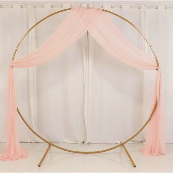 Blush sheer backdrop drape for wedding arch and ceiling decor.