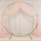 Blush sheer backdrop drape for wedding arch and ceiling decor.
