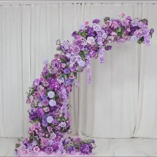 Lavender floral backdrop for wedding arch with roses and hydrangeas.