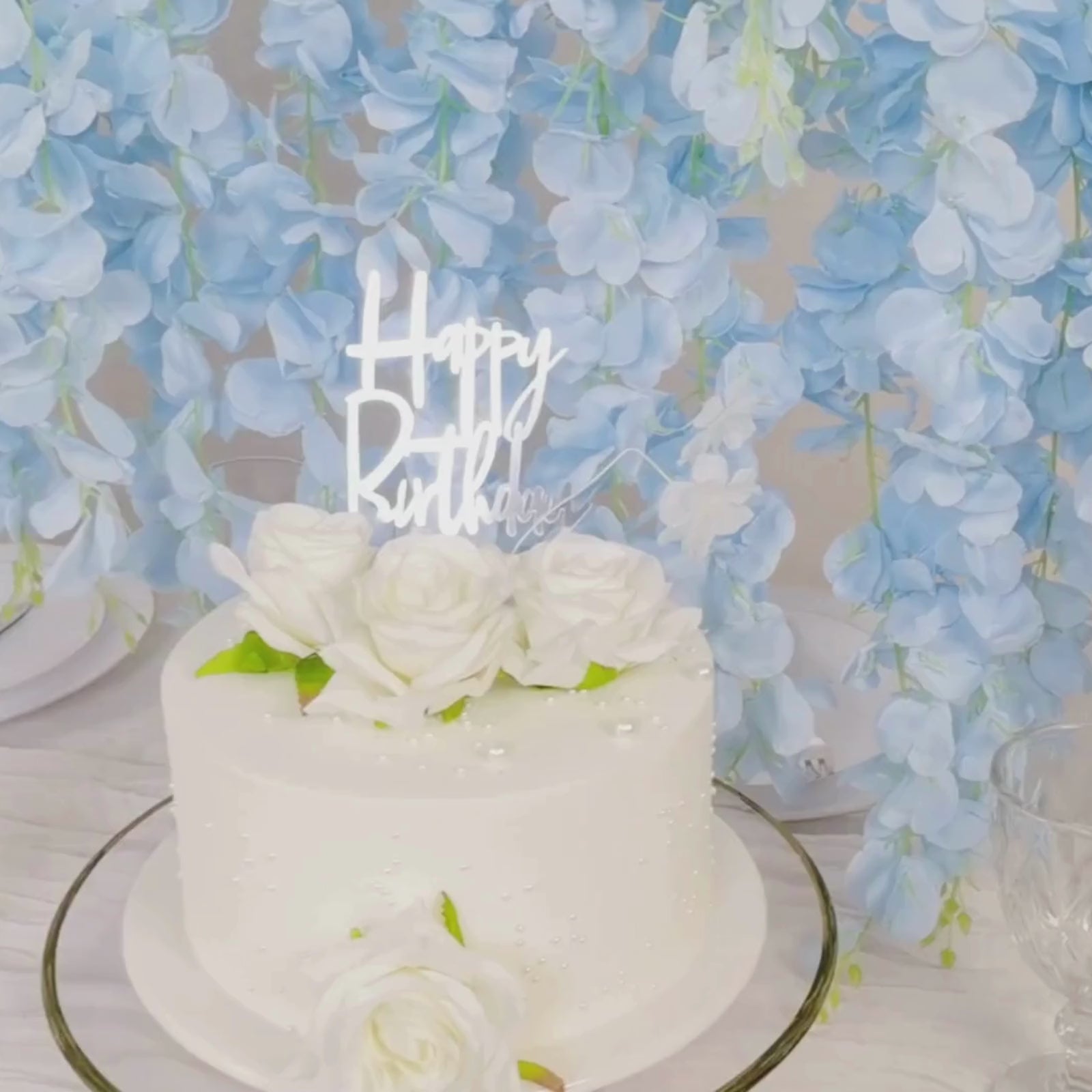 Light blue silk wisteria flower garland vines with cake decoration.