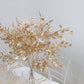 Gold metallic artificial leaf spray for decorative arrangements.