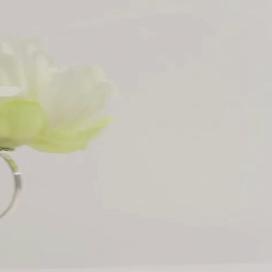 Ivory floral napkin holder with silk peony flower for dining table settings.