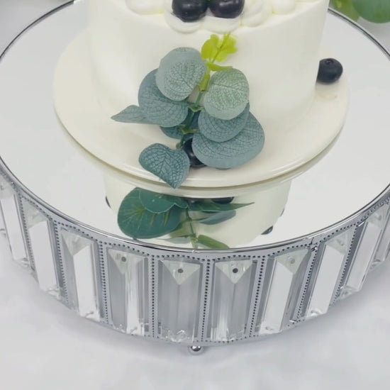 Silver metal crystal pendant cake stand with mirror top and dessert display.