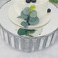 Silver metal crystal pendant cake stand with mirror top and dessert display.