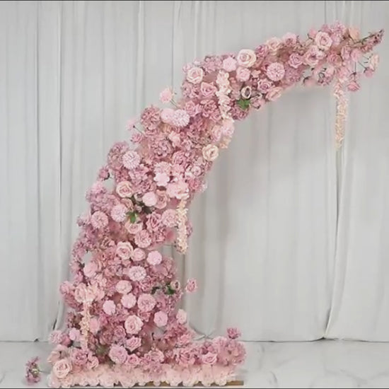 Dusty rose floral backdrop for wedding arch with roses and hydrangeas.